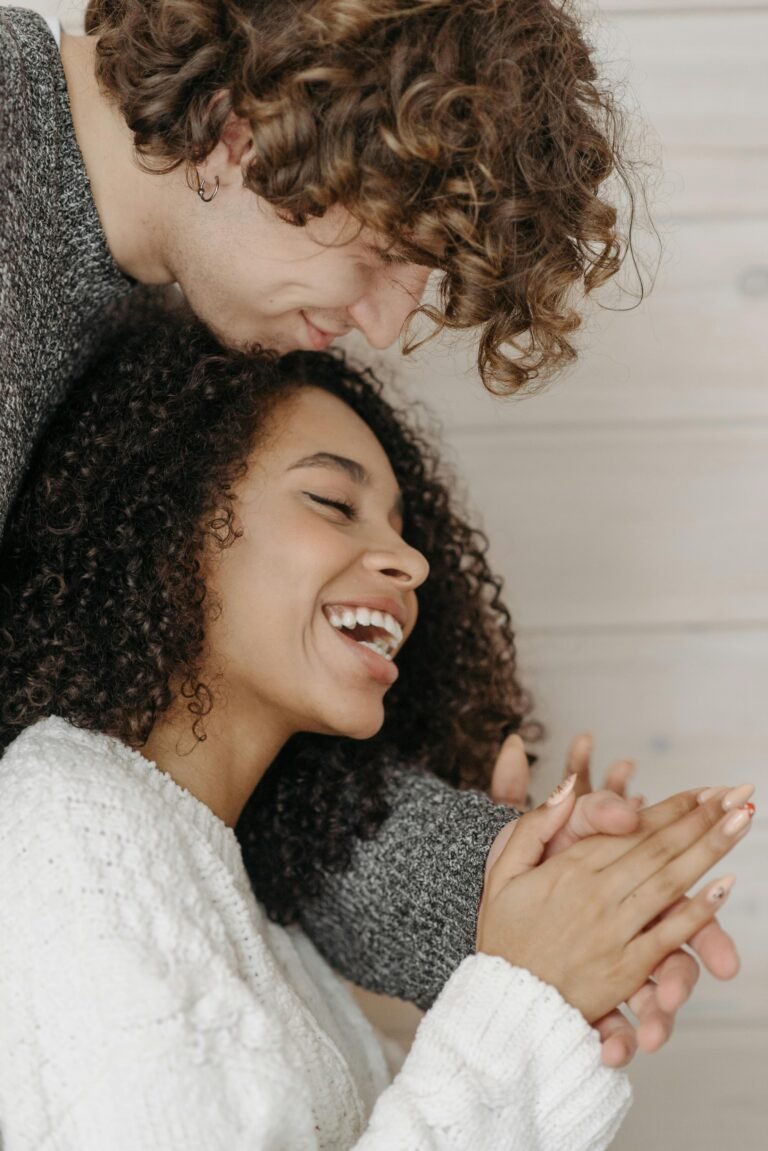 Couple laughing and reconnecting representing the free 7-Day Couples Communication Workbook from Revive Intimacy